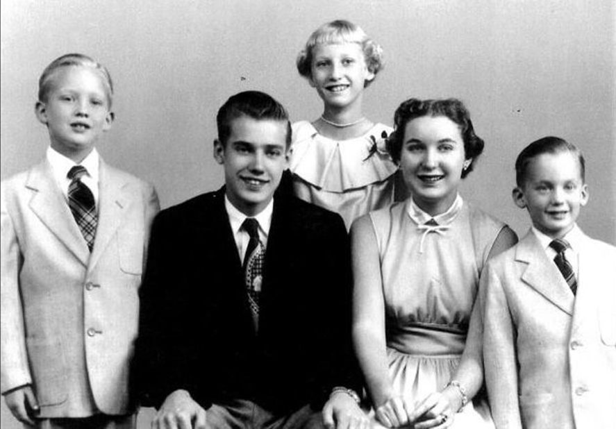 Trump, left, in a family photo. He was the second-youngest of five children.