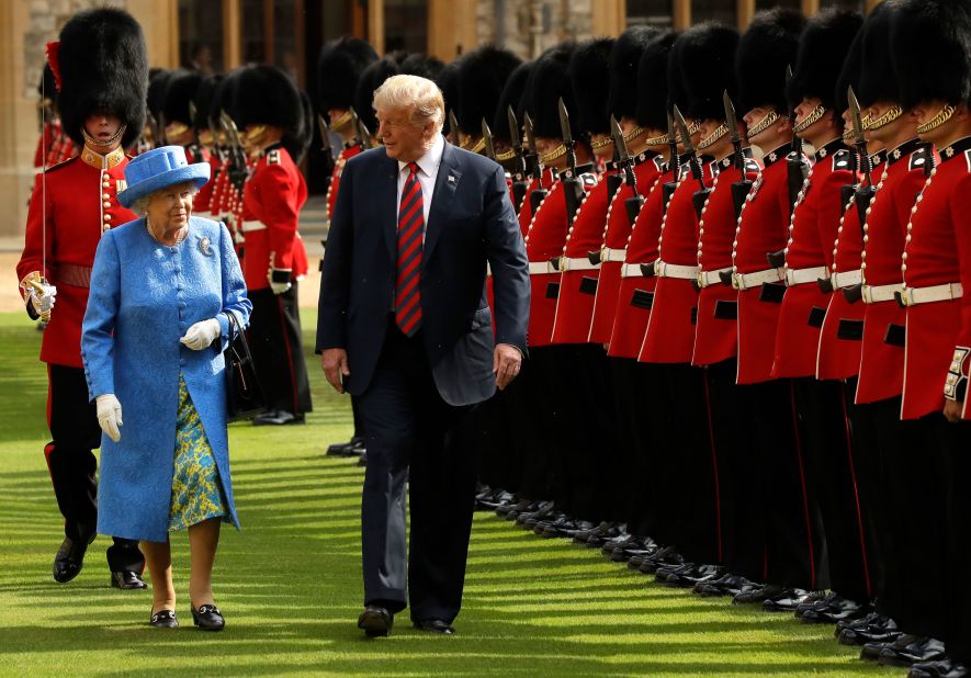 Trump and Britain's Queen Elizabeth II inspect a guard of honor during <a href=